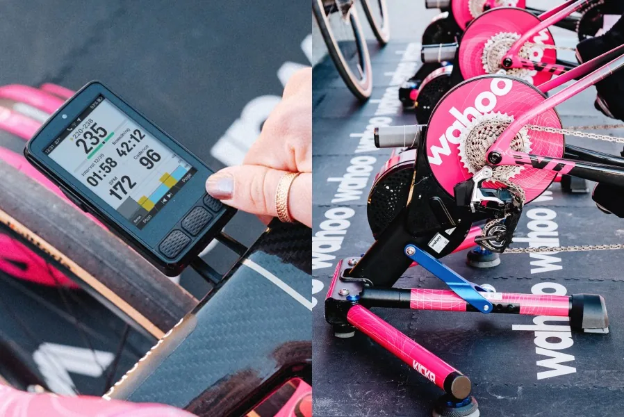 Cyclist using a Wahoo ELEMNT bike computer on an indoor KICKR smart trainer setup